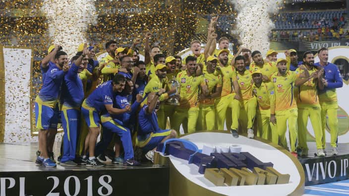 Members of Chennai Super Kings pose with trophy after winning against Sunrisers Hyderabad's at VIVO IPL cricket T20 final match in Mumbai, India, Sunday, May 27, 2018