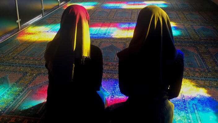 Rear View Of Women In Mosque