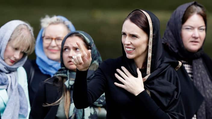  Prime Minister Jacinda Ardern, second right, gestures as she leaves Friday prayers at Hagley Park in Christchurch