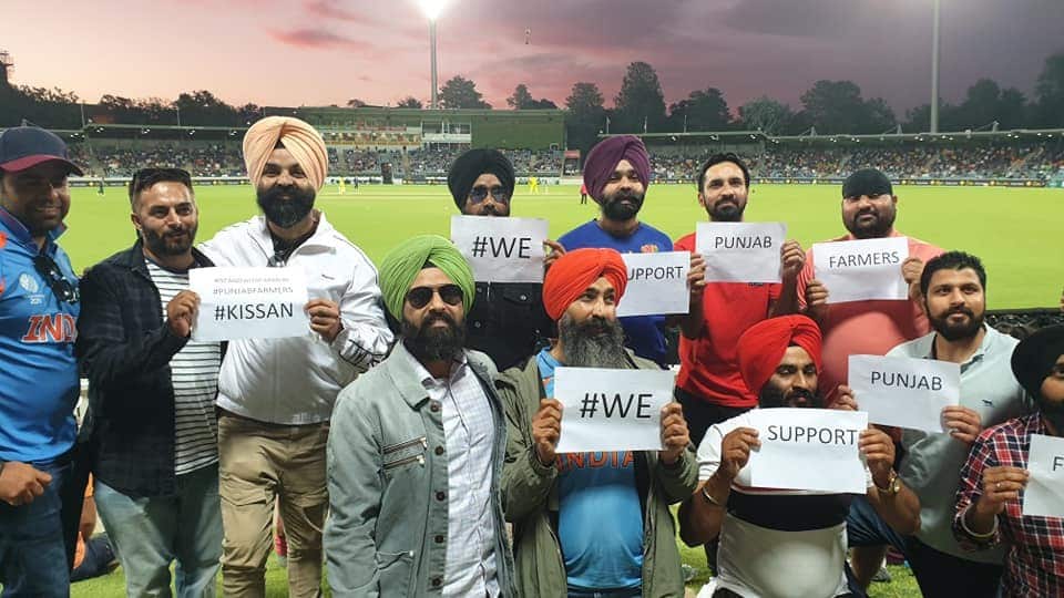 A group of protesters at Canberra cricket ground that hosted India-Australia day-night match yesterday