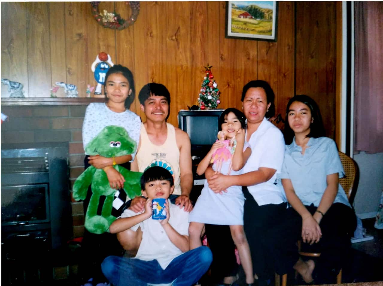 James with his parents and siblings