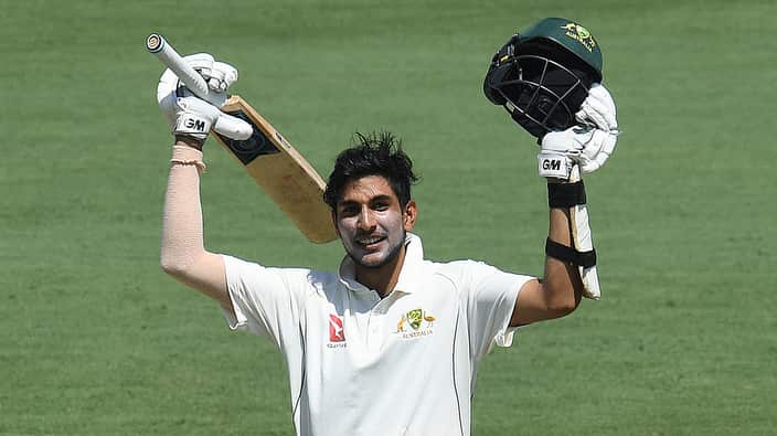 Jason Sangha celebrates scoring a century