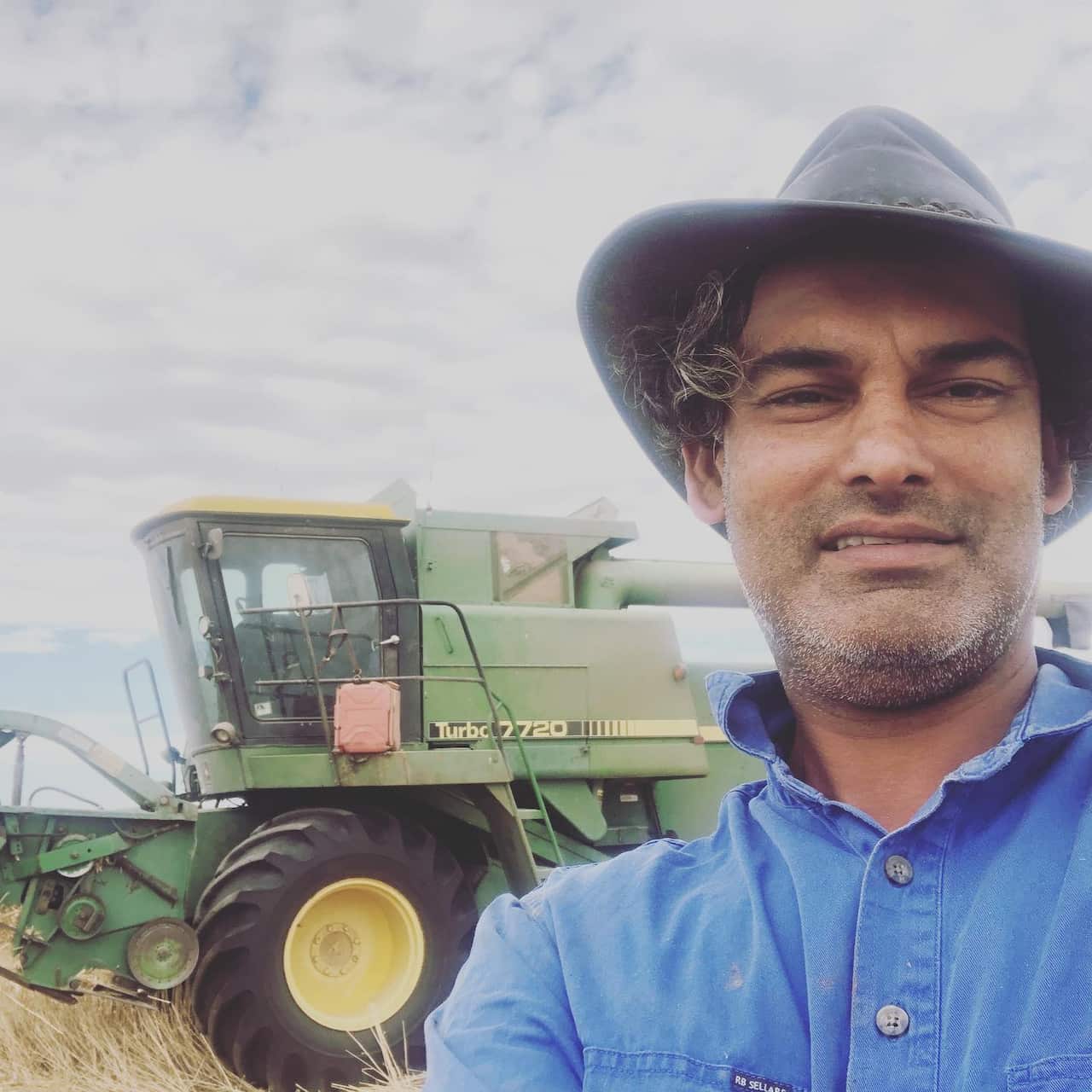 Jason Sondhu harvesting wheat at Jullundur Farms in western Victoria