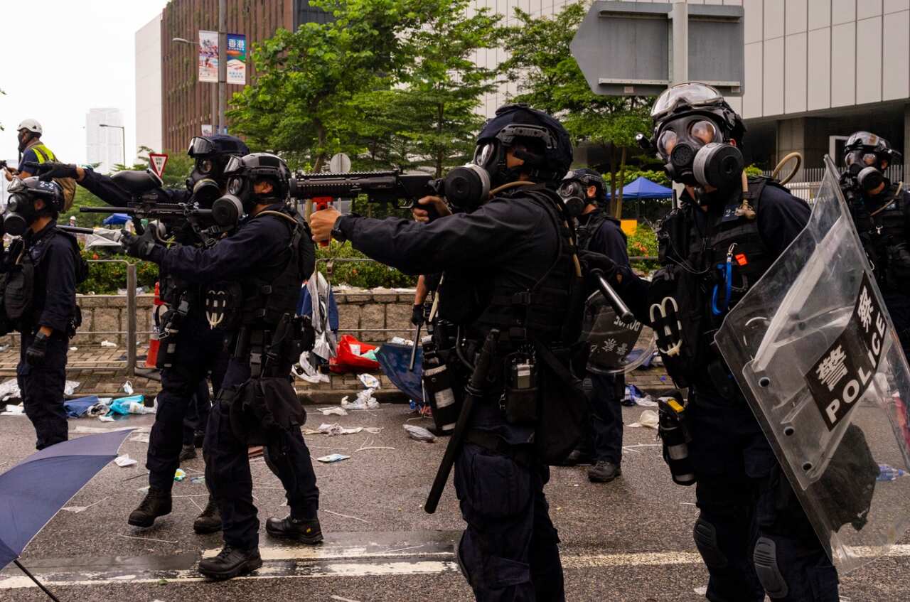 June 12, 2019 - Hong Kong -A superior targets protestors for his men to hit with rubber bullets. 