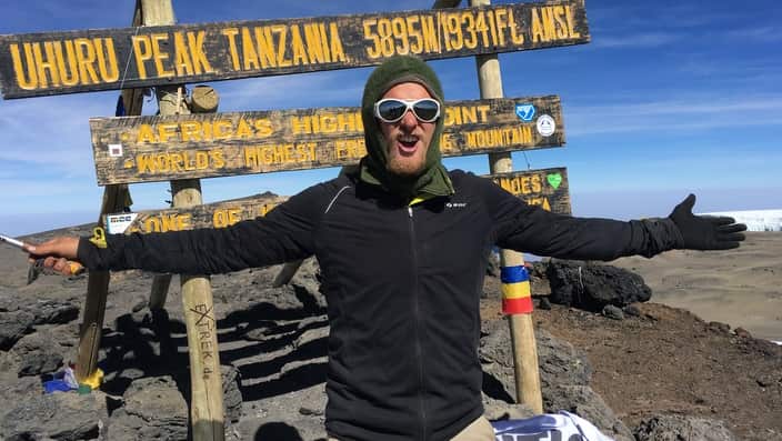 Jonathan Ljunqvist at the summit of Mt Kilimanjaro