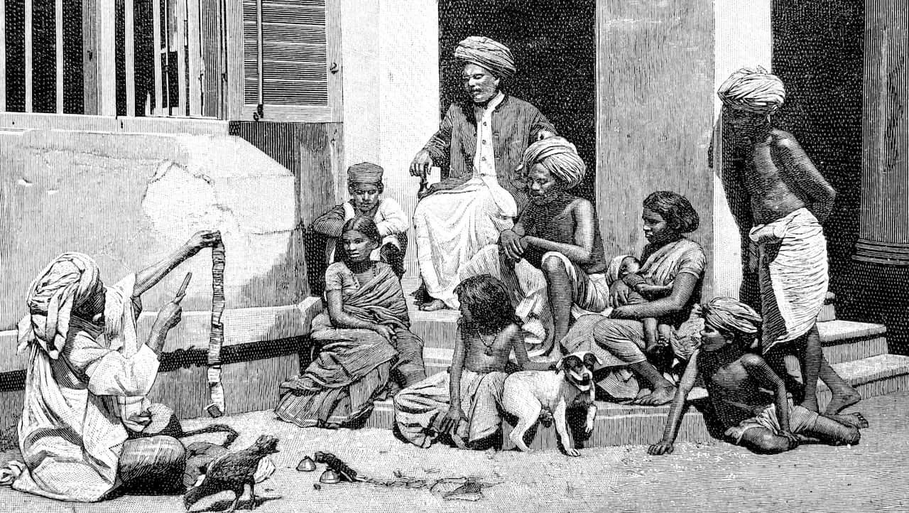 An Indian juggler at a street performance