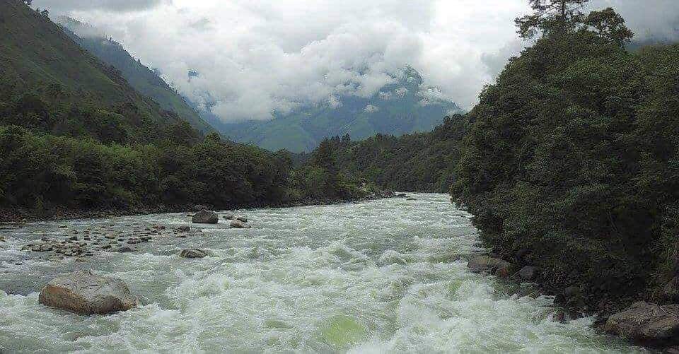 The river the children cross daily in remote N.E. areas