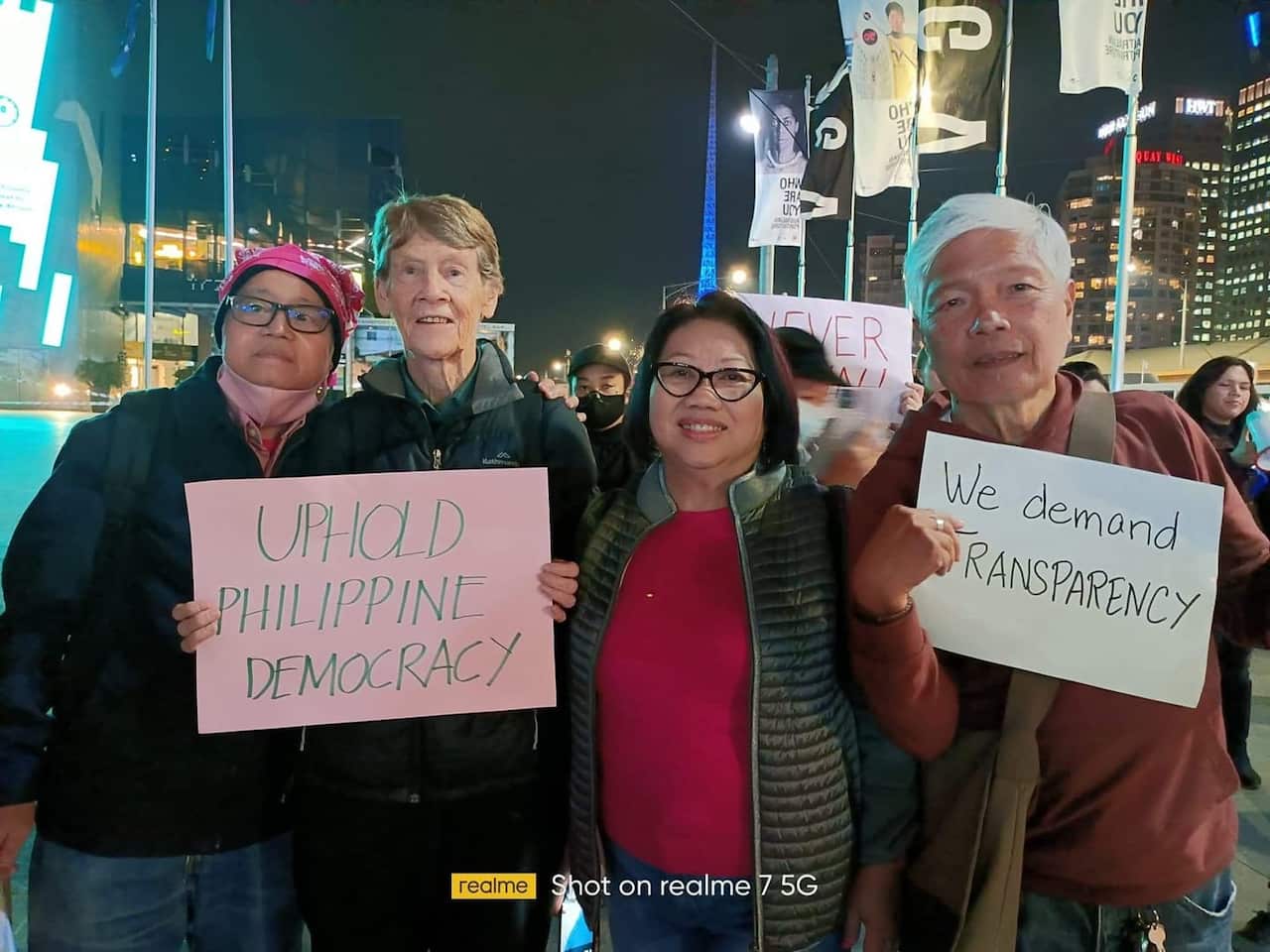 Organisers of protest and prayer rally Carlos Ocampo with Sister Patricia Fox, Melba Marginson and Rico Dizon at Federation Square Melbourne (11 May 2022)