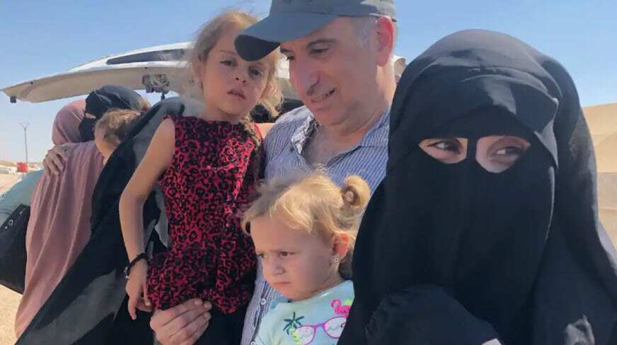 Kamalle Dabboussy with his daughter, Mariam Dabboussy, and grandchildren in Al-Hol camp in Syria in 2019