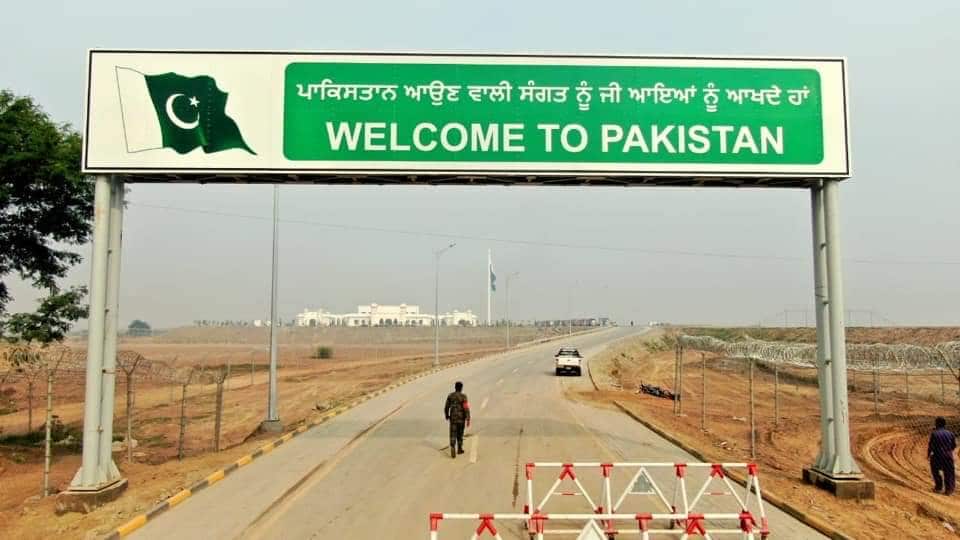 A sign in Gurmukhi to welcome Sikh pilgrims to Kartarpur Sahib in Pakistan