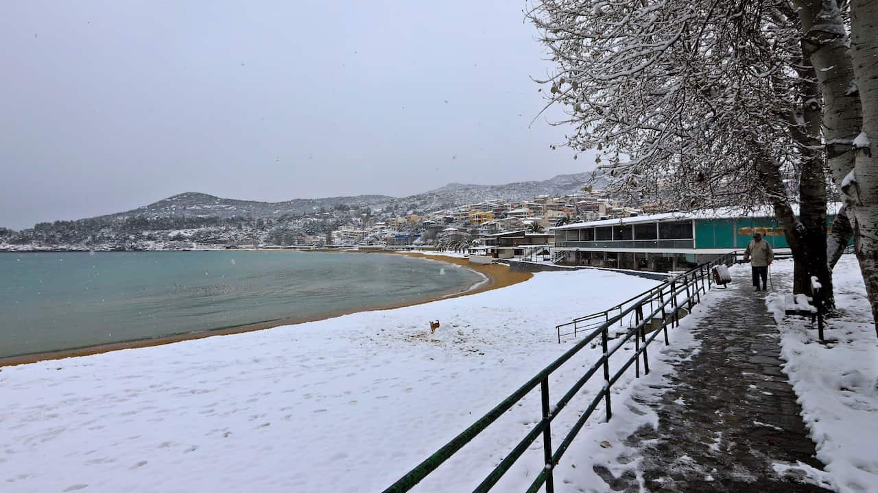 beach covered in snow Greece