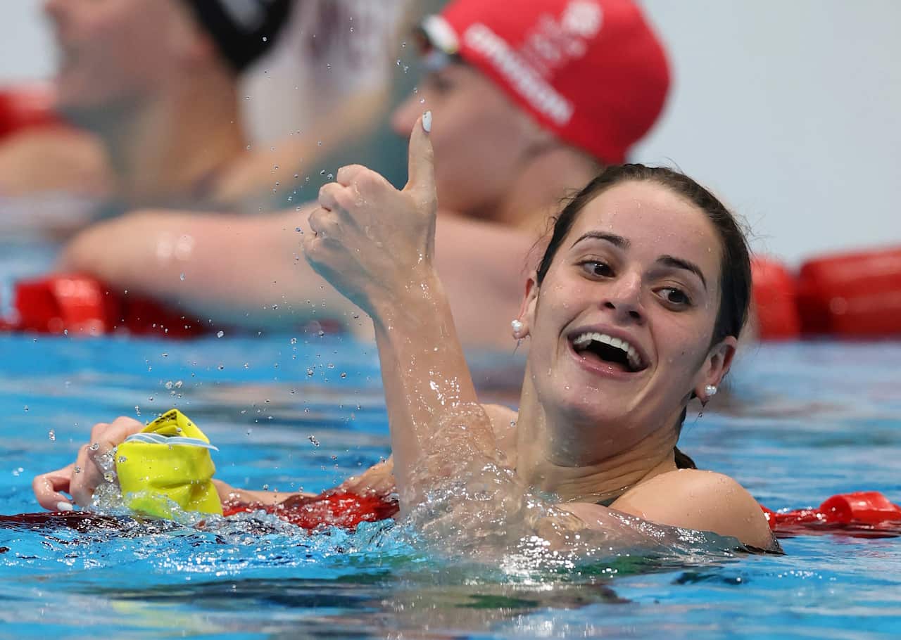 McKEOWN Kaylee of Australia reacts after winning women's 100m backstroke final at Tokyo Aquatics Centre in Tokyo on July 27, 2021. won the event to claim gold medal. ( The Yomiuri Shimbun via AP Images )