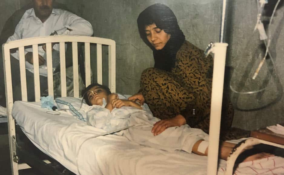 Kaz Eskerie on hospital bed in 1993