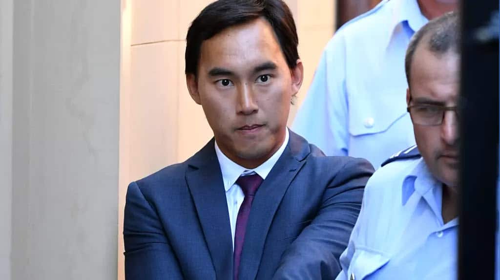 Kevin Ly is escorted from NSW Supreme Court on Monday