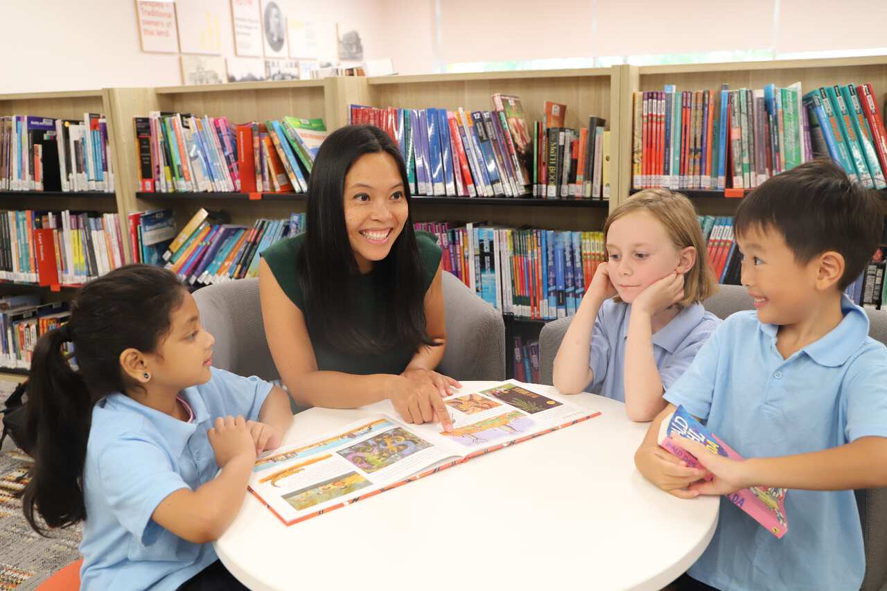 Sally Sitou with community kids