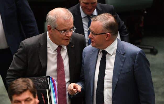 Scott Morrison and Anthony Albanese leave Question Time.