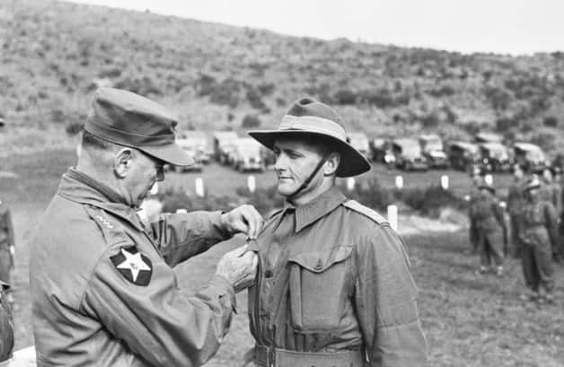 Kapyong veteran receives the US Presidential Distinguished Unit Citation Device from General James Van Fleet. General Van Fleet, Commanding the 8th US Army.