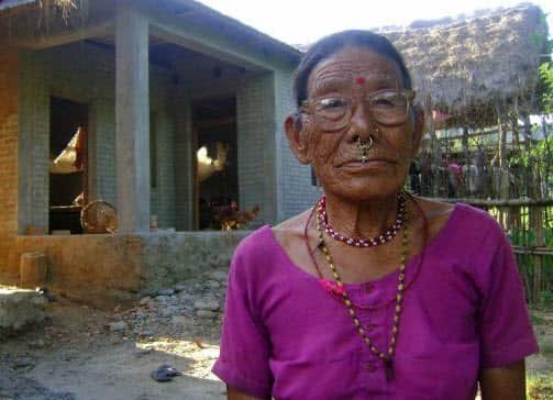 2012 photo of Kusunda language speaker Gyani Maiya Sen, 76, poses for a photo at her home in the remote district of Dang in western Nepal.