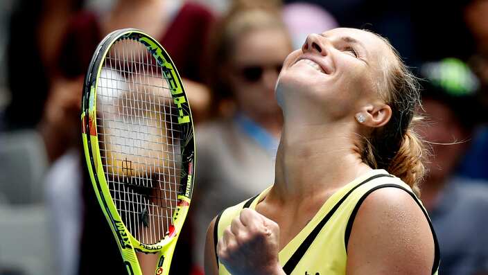 Russia's Svetlana Kuznetsova celebrates after defeating Serbia's Jelena Jankovic during their third round match at the Australian Open tennis championships in Melbourne, Australia, Friday, Jan. 20, 2017. (AP Photo/Kin Cheung)