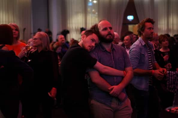 Labor supporters watch the tally count at the Federal Labor Reception at Hyatt Place Melbourne