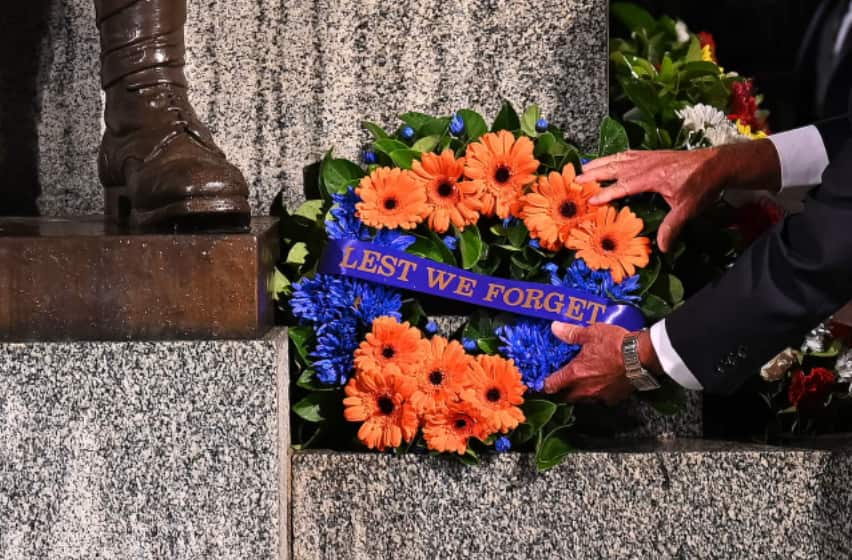A tribute left by a member of the public rests against the Cenotaph during the annual Anzac Day Dawn Service at Martin Place in Sydney.