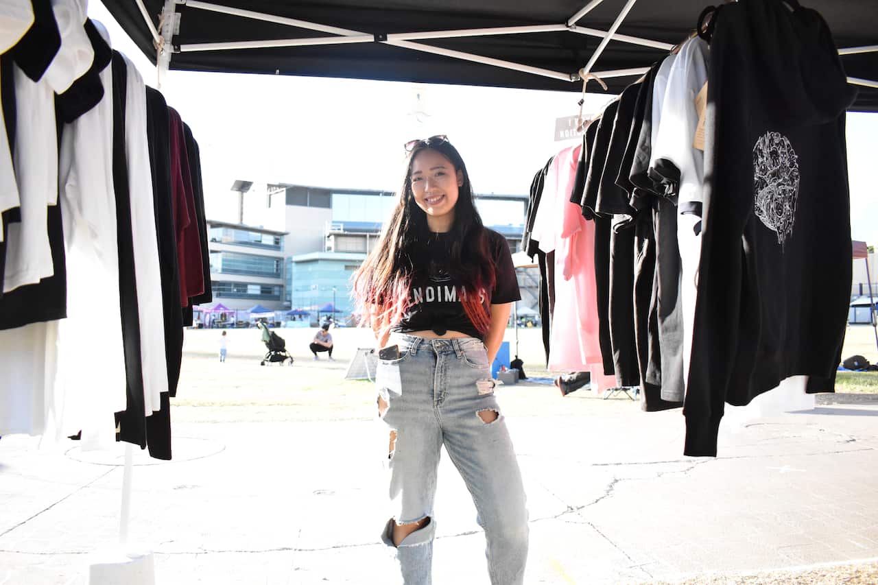 Chinese Australian voter Louise Qiu says the Liberal Party is procrastination on climate change. 