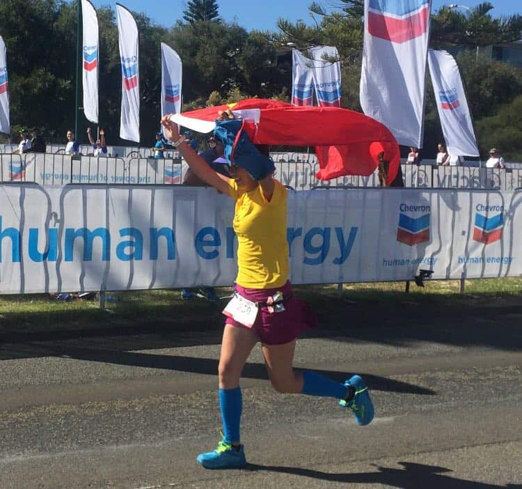Xiao Song , running with a Chinese national flag