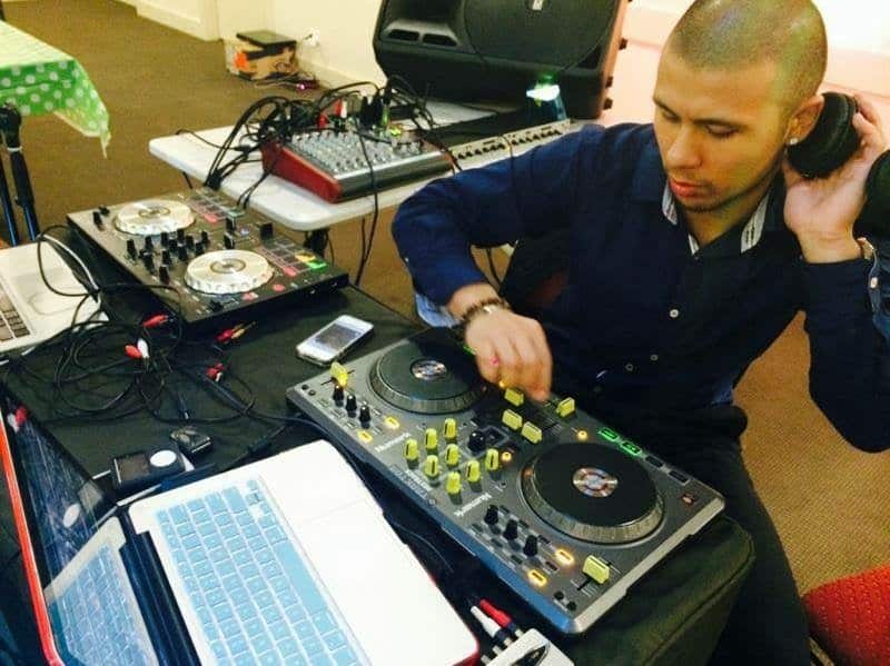 Michael mixing some music in a corporate event