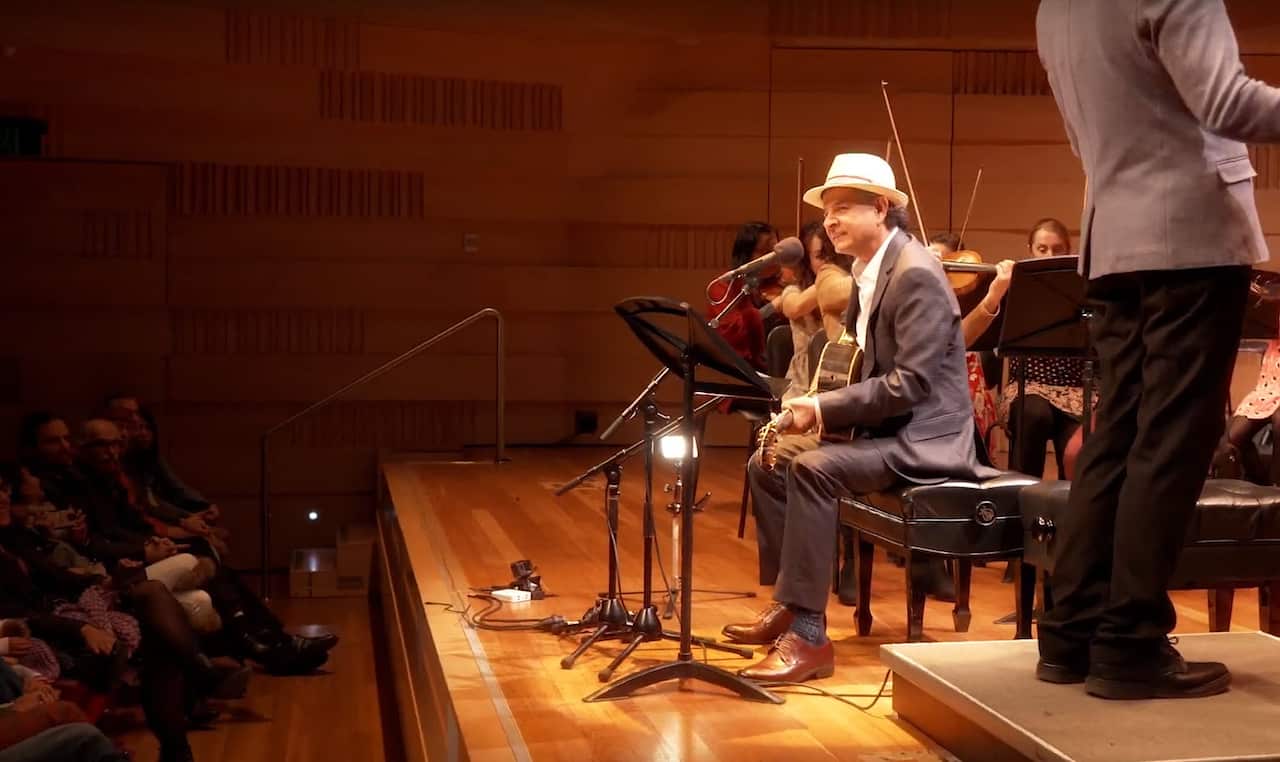 Music artist Mahmood Khan performing with the Willoughby Symphony Orchestra and Gambirra Mob in Sydney
