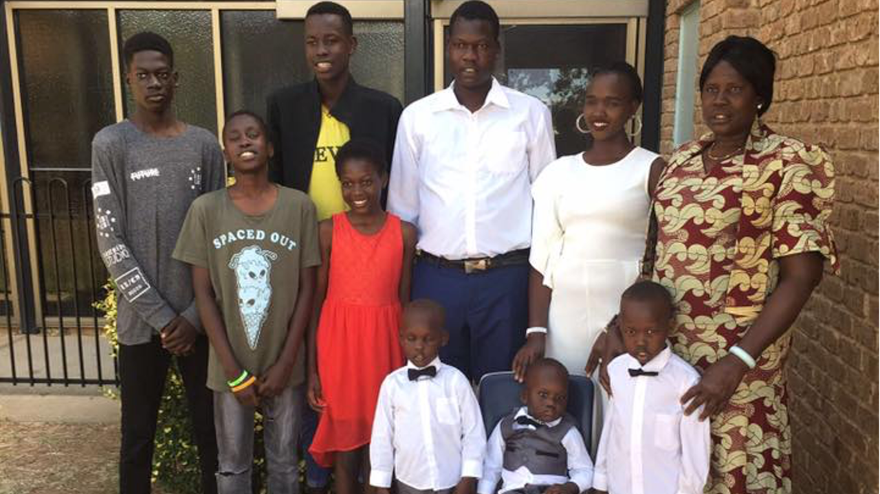 Deng Garang Deng with member of his extended family 