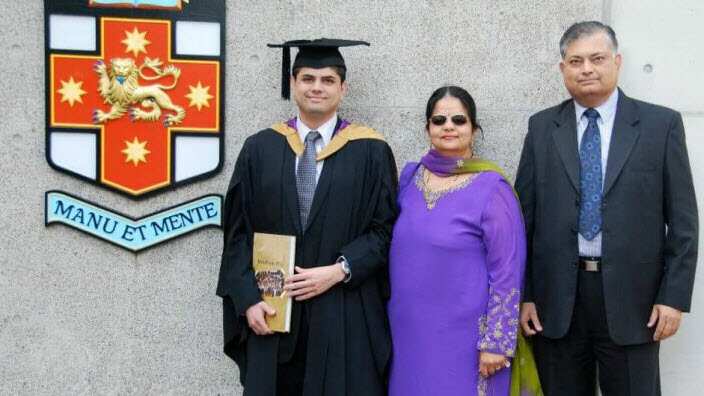 Malay Rana (L) with his parents.