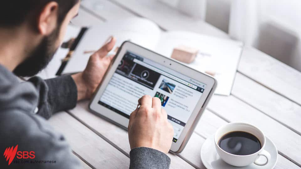 vietnamese, man reading