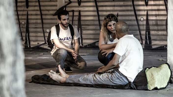 Emfasis Foundation volunteers assisting homeless people in Greece. 