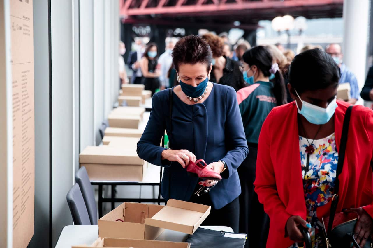 Sydney's Mayor Ms Clover More is trying a 'migrant's shoe"