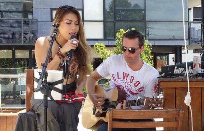Mary Ann Van Der Horst singing in one of her acoustic gigs.