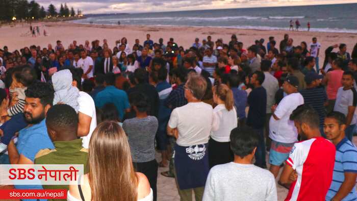 Community members gather at a mass to pray for departed soul of Nepali Student Nishchal Ghimire in Adelaide's Glenelg Beach