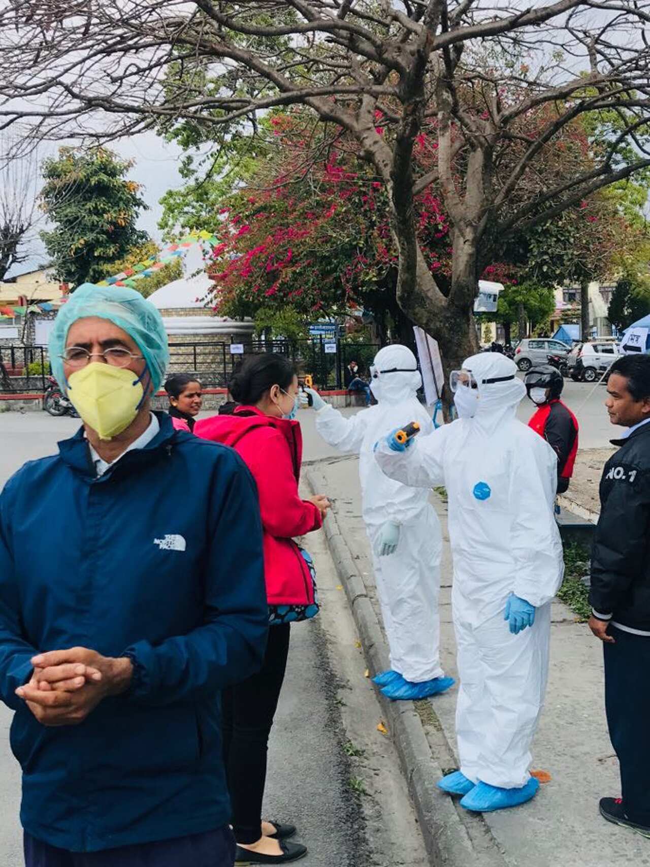 medical personnel wear protective equipment in pokhara