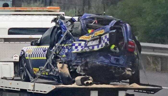 Four police officers have died in a crash involving a truck on Melbourne's Eastern Freeway. 