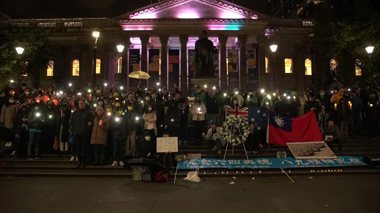 Pro-democracy supporters at the Tiananmen candlelight vigil in front of the State Library of Victoria. 