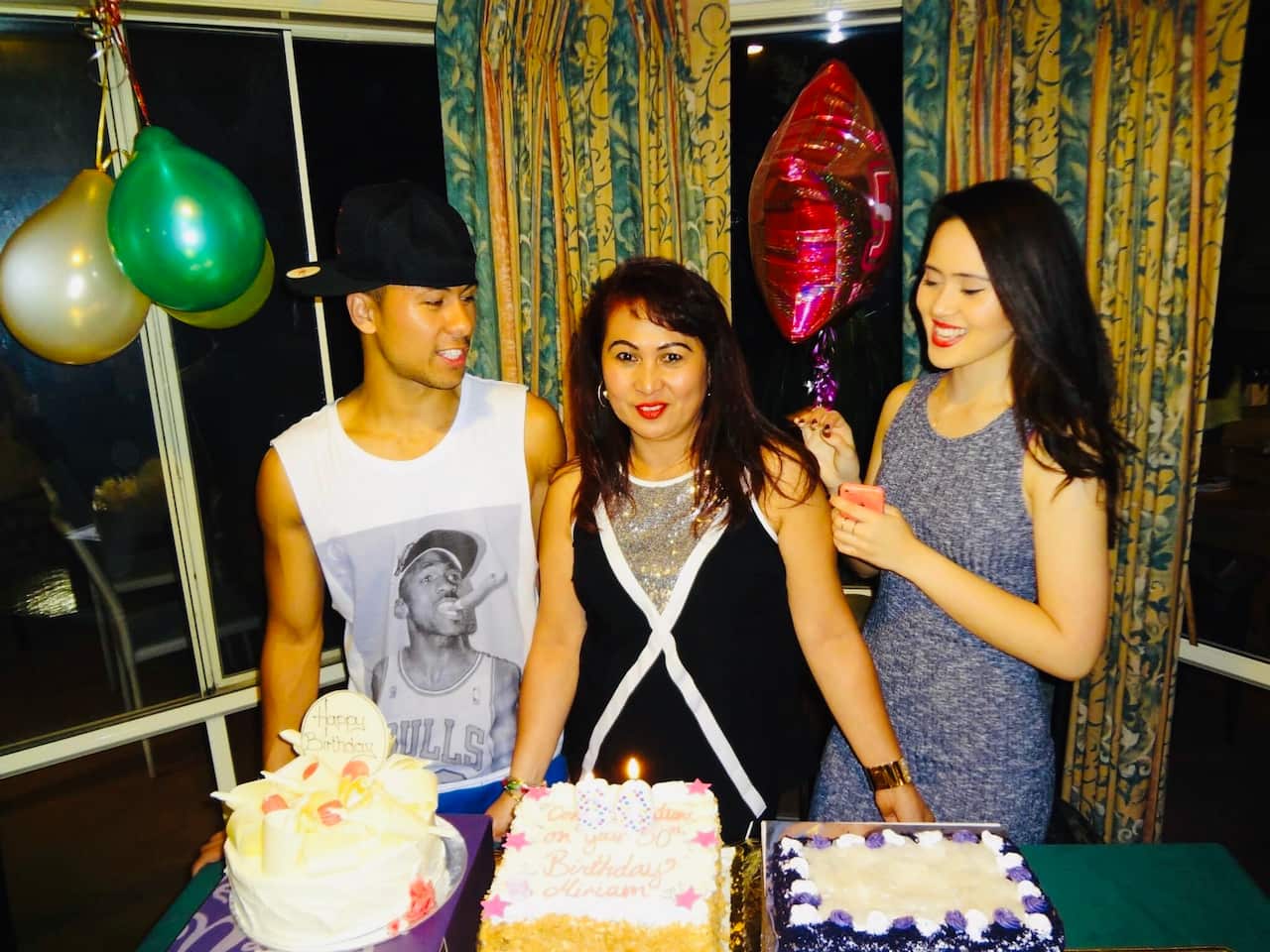 Michael with mum Miriam and sister Savanah Catayas.