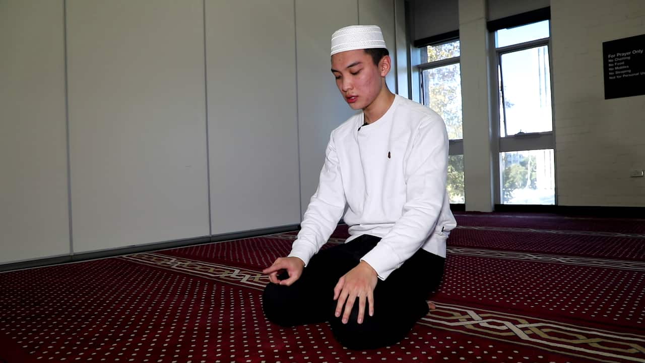 Chinese Muslim Harry Dong pray at Religious Centre at UNSW.