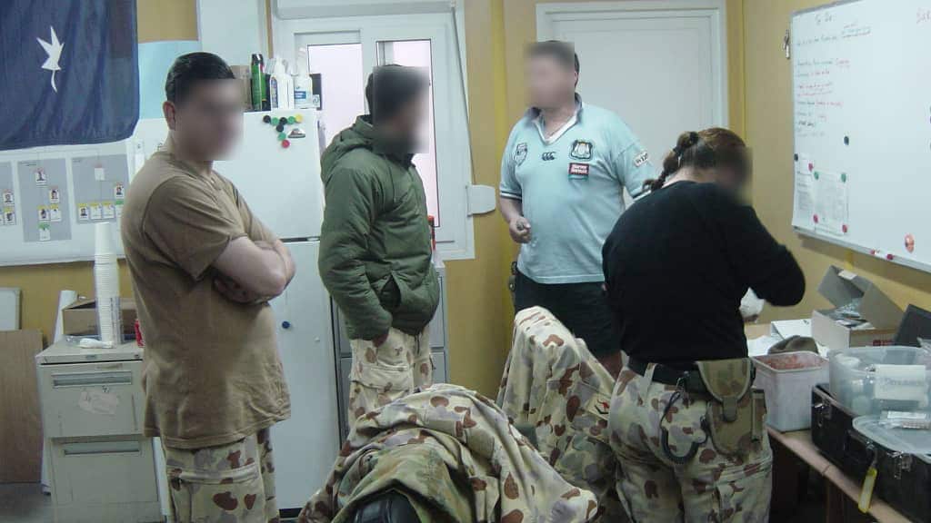 Image supplied by Jamshed (L) with Australian soldiers in Afghanistan.