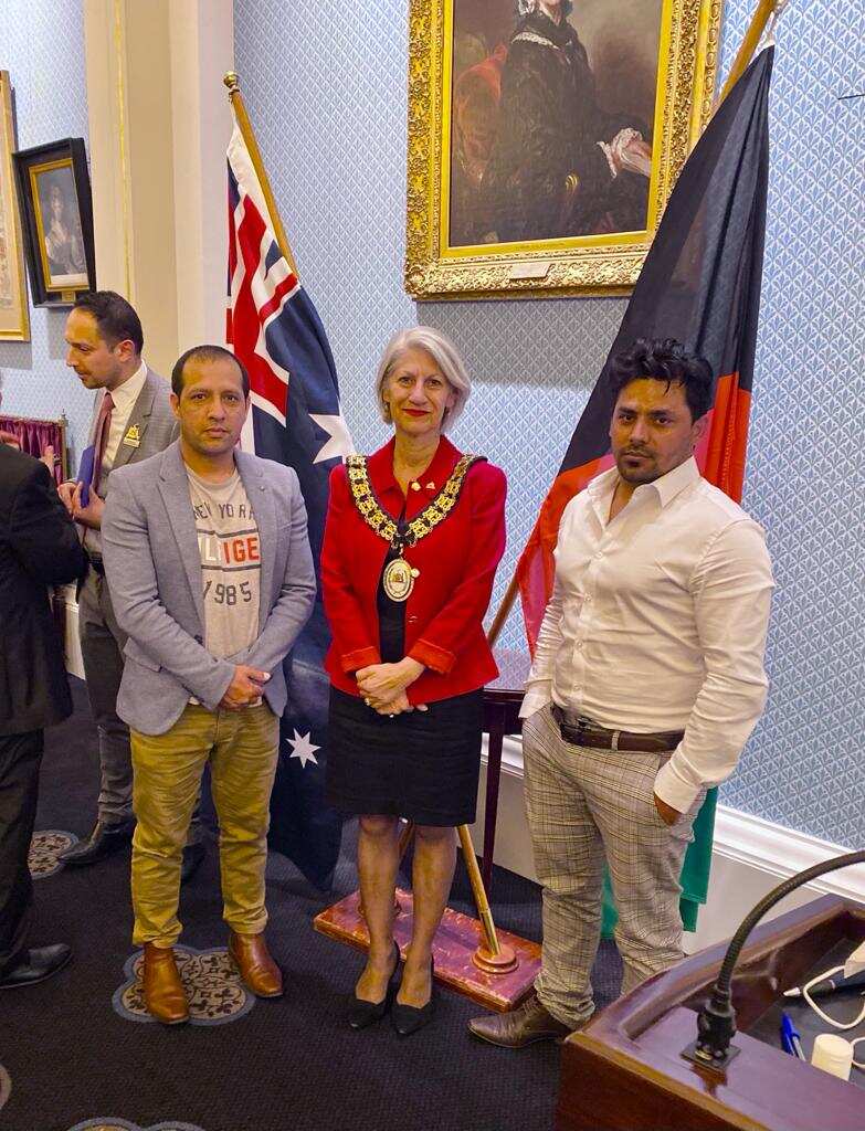 Samander Sediqi (right) during Afghanistan's independence day celebration ceremony in Adelaide.