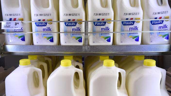 A stock image of milk bottles in a new Woolworths supermarket in Everton Park in Brisbane's northern suburbs, Monday, May 11, 2015. (AAP Image/Dan Peled) NO ARCHIVING