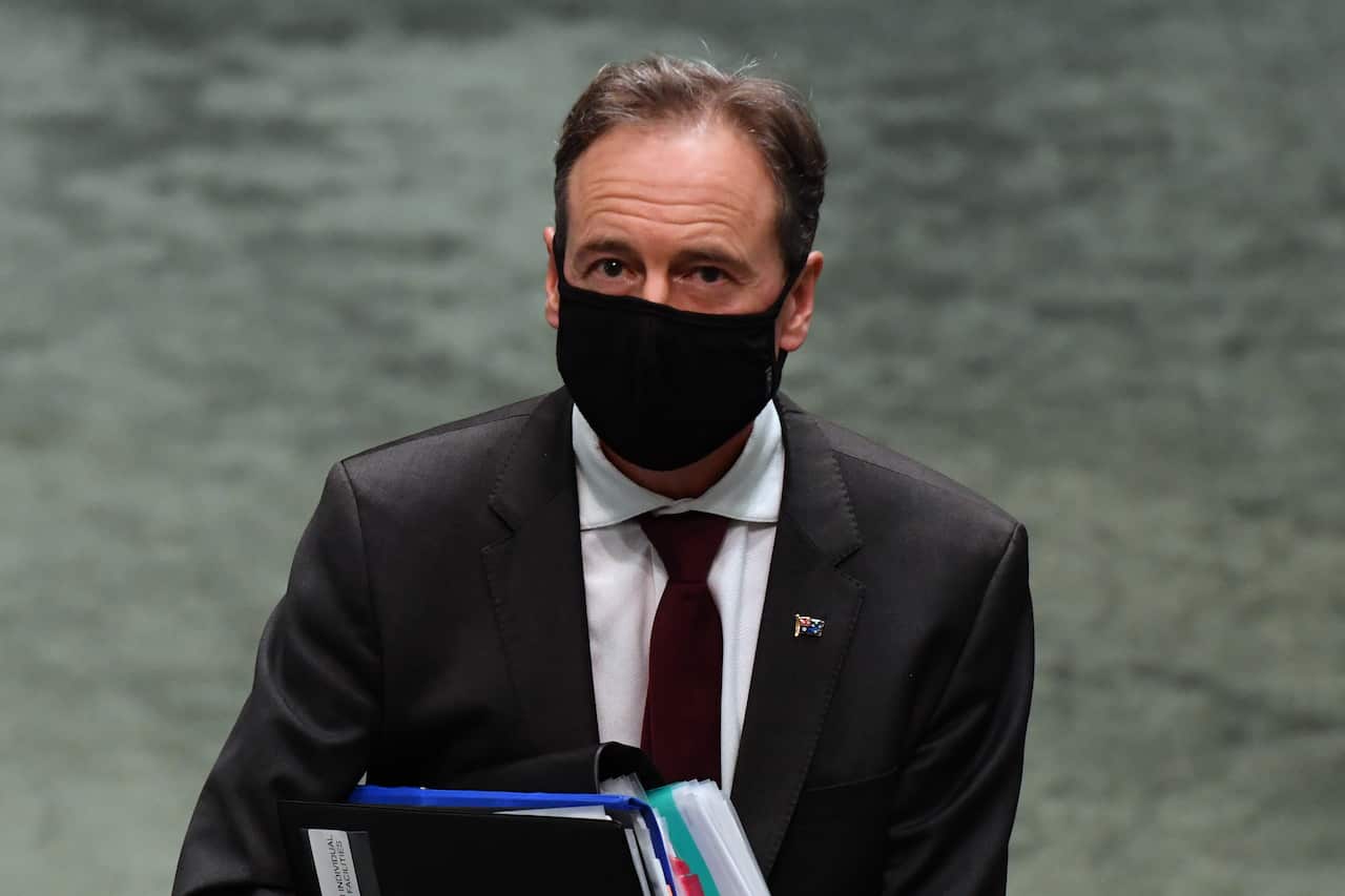 Minister for Health Greg Hunt leaves after Question Time in the House of Representatives at Parliament House in Canberra, Thursday, October 29, 2020. (AAP Image/Mick Tsikas) NO ARCHIVING