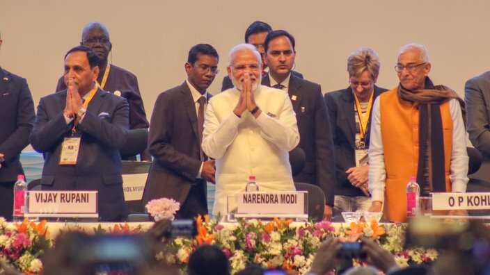 Prime Minister Narendra Modi and Gujarat Chief Minister Vijay Rupani seen in the presence of other delegates at Vibrant Gujarat Global Summit.