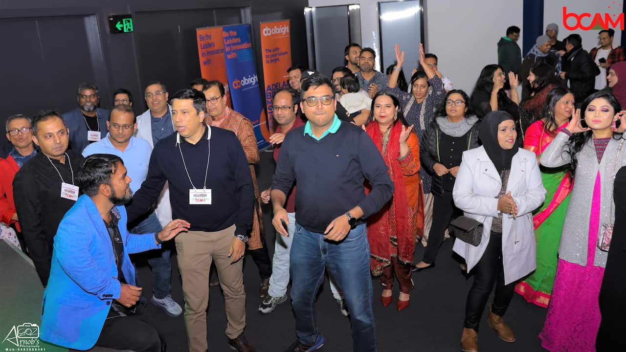 The audience is also dancing to the music during a performance of celebrated Bangladeshi singer Momtaj. 