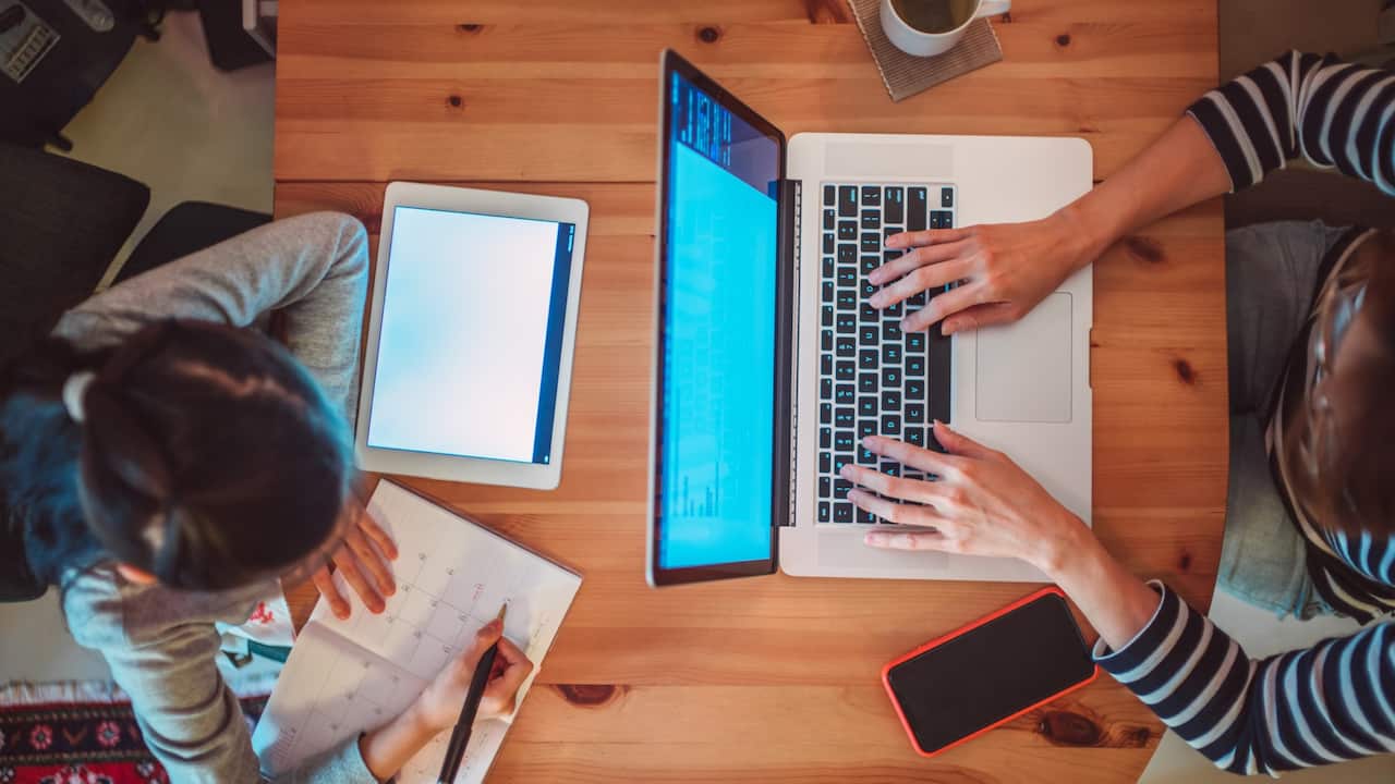 Mum daughter on devices
