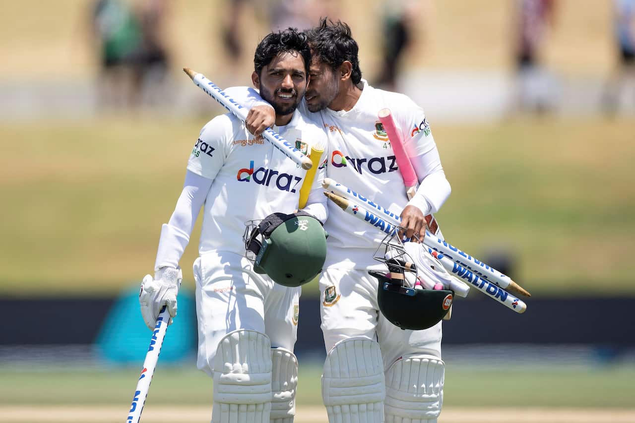 Bangladesh's captain Mominul Haque, left, and Mushfiqur Rahim after their win cricket test between Bangladesh and New Zealand in Mount Maunganui, NZ.