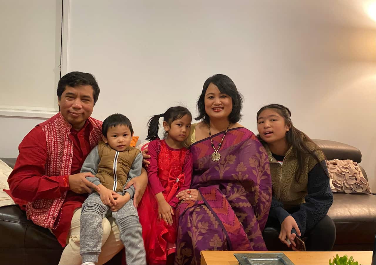 Nairwng Tripura with her parents and siblings